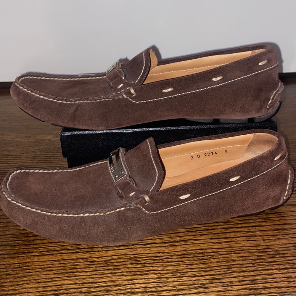 AUTHENTIC Prada Mens brown suede driving shoes with silver buckle.